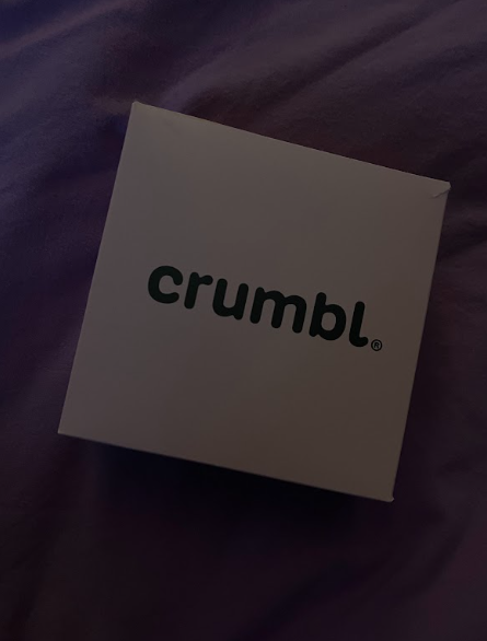 A box from Crumbl Cookies.